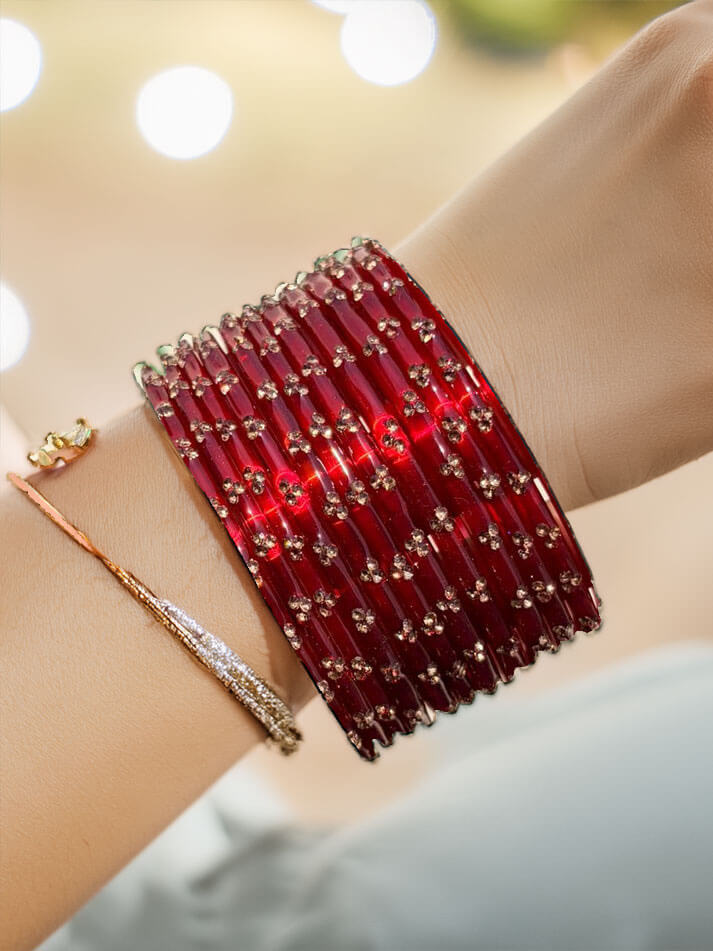 Assorted jewellery on a red velvet surface